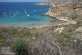 Magnificent views of Riviera Beach and the small watchtower Ghajn Tuffieha Tower, Mellieha, Malta. Royalty Free Stock Photo