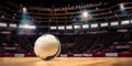 Magnificent volleyball arena with a volleyball ball on a wooden floor with spectators in the grandstand. Professional world sport