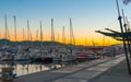 Magnificent warm sunset color in marina harbor. End of a warm sunny day in Ibiza, St Antoni de Portmany, Spain. Royalty Free Stock Photo