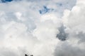 magnificent waves of white clouds against clear blue sky Royalty Free Stock Photo