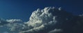 Magnificent white Cumulonimbus cloud in blue sky. Australia.