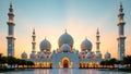 Grand White Mosque with Majestic Domes and Minarets at Golden Sunset Royalty Free Stock Photo