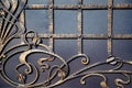 Magnificent wrought-iron gates, ornamental forging, forged elements close-up Royalty Free Stock Photo