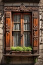 Magnificently decorated wooden window shutters with intricate knot designs and historical scenes ornate