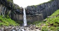 Magnificent Svartifoss waterfall also known as the Black fall. Located in Skaftafell, Vatnajokull National Park, in southern