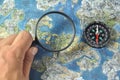 Magnifier,compass and map