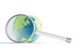 Magnifier and earth sphere Royalty Free Stock Photo