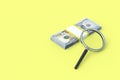 Magnifier near money. Detection of suspicious transactions, counterfeit funds Royalty Free Stock Photo