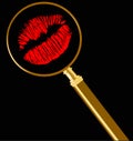 Magnifier and red lips imprint Royalty Free Stock Photo