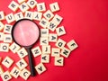a magnifier and scrabbles pieces Royalty Free Stock Photo