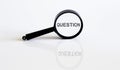 Magnifier with text QUESTION on the white background