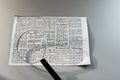 magnifier tool on a newspaper