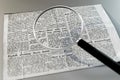 magnifier tool on a newspaper