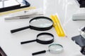 Magnifiers, thermometer in scientific laboratories