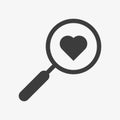 Magnifiyng glass with heart. Searching a love sign Royalty Free Stock Photo