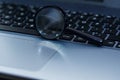 Magnifyer glass on laptop computer keyboard in blue tone, Royalty Free Stock Photo