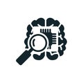 Magnifying glass analyzing microchip inside brain for artificial intelligence