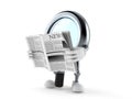 Magnifying glass character reading newspaper Royalty Free Stock Photo