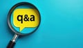 Magnifying glass examines yellow speech bubble with QA text. Offers search for information, help, support. Solves problems, Royalty Free Stock Photo