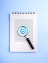 Magnifying glass focusing on blue check mark over notebook page symbolizing data verification, information accuracy, document Royalty Free Stock Photo