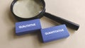 Magnifying Glass Focusing on Qualitative and Quantitative Text Blocks Representing Research Methods and Data Analysis Royalty Free Stock Photo