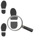 Magnifying glass increases footprint of man