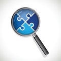 Magnifying glass jigsaw blue Royalty Free Stock Photo