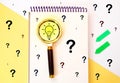 Magnifying glass with light bulb icon and question mark symbol. Concept creative idea and innovation Royalty Free Stock Photo