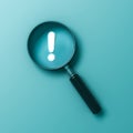 Magnifying glass with neon light exclamation mark isolated on light blue green pastel color wall background Royalty Free Stock Photo