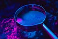 a magnifying glass on a nighttime background in blue and purple colors, in the style of data visualization, digital print,