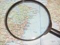 Magnifying glass on the North American map background. Map and magnifying glass. Concept travel route planning. Royalty Free Stock Photo