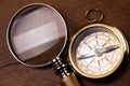 Magnifying glass and old map, colorful bright journey theme Royalty Free Stock Photo