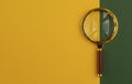 Magnifying glass over yellow and green background Royalty Free Stock Photo