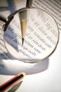 Magnifying glass and pen Royalty Free Stock Photo