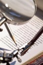 Magnifying glass and pen Royalty Free Stock Photo