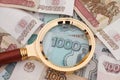 Magnifying glass and russian money Royalty Free Stock Photo