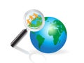 Magnifying glass searching on earth