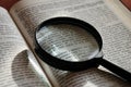 Magnifying glass on Ukrainian bible page