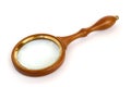 Magnifying glass with wooden handle Royalty Free Stock Photo