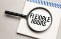 Magnifying glass with the word FLEXIBLE HOURS on chart background