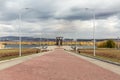 MAGNITOGORSK, RUSSIA - OCTOBER, 2018: Monument Rear-front a large famous sculpture and Eternal flame in granite flower Royalty Free Stock Photo