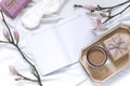 Magnolia flower flat lay morning in bed concept composition. Royalty Free Stock Photo