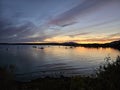 Magog Memphremagog Lake mountains orange red sky sunset Quebec Royalty Free Stock Photo