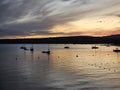 Magog Memphremagog Lake mountains orange red sky sunset Quebec Royalty Free Stock Photo