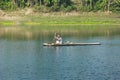 Magura, Bangladesh- November 20,2017: An wooden row boat sailor sailing his boat on the river of Magura Bangladesh