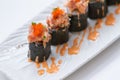 Maguro Maki Sushi Topping with Maguro Bluefin Tuna with Sauce and Ebiko Shrimp Egg Served with Wasabi and Prickled Ginger Royalty Free Stock Photo