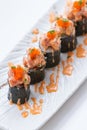 Maguro Maki Sushi Topping with Maguro Bluefin Tuna with Sauce and Ebiko Shrimp Egg Served with Wasabi and Prickled Ginger Royalty Free Stock Photo