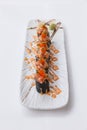 Maguro Maki Sushi Topping with Maguro Bluefin Tuna with Sauce and Ebiko Shrimp Egg Served with Wasabi and Prickled Ginger Royalty Free Stock Photo