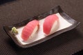 Maguro sushi, with wasabi on ceramic dish, tuna with sushi rice Royalty Free Stock Photo