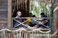 Mah Meri people at wooden house.